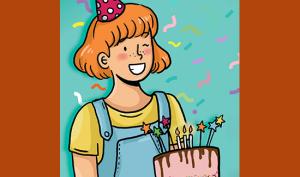 Une petite fille souriante tien gâteau d'anniversaire devant elle